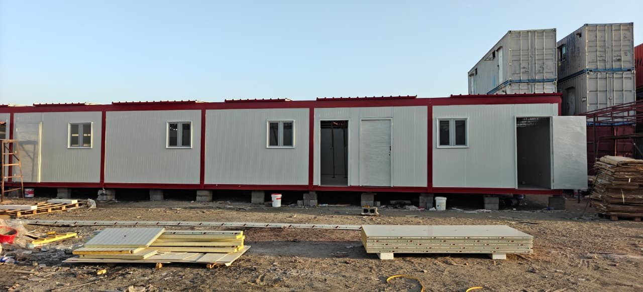 Modular cabin units staged in a fabrication yard